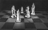 Одна з фотографій уявного голографічного зображення шахових фігур при різних точках зйомки